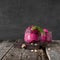 Beetroot puree with prunes and walnuts glass jars. Rustic style.