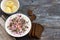 Beetroot soup, svekolnik, holodnik, on kefir, with cucumber, boiled eggs and greens on a wooden table