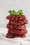 Beetroot vegan burgers with chickpea and herbs. Healthy vegetarian food concept. Copy space, light background.