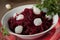 Beets with small pickled onions and parsley