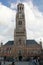 Beffroi tower of Bruges with a cloudy sky