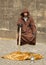 A beggar showing levitation at the center of Pragu