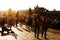 Beggar and tourists on the Charles Bridge in Prague