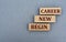 BEGIN NEW CAREER - words on wooden bars on a gray background with a free space