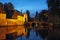 Beguinage bridge by night, Bruges, Belgium.