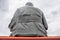 Behind or back of statue of monk or priest of buddha statue.