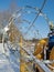 behind the barbed wire is a gas compressor station with yellow-blue pipes