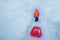 From behind boy pull on uphill with sled, at winter vacations