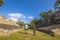 Behind shot of the tourists visiting Copan Ruinas and its beautiful Mayan ruins in Honduras