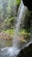 Behind the waterfall Sgwd yr Eira in Brecon Beacons