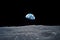 Behold the breathtaking image of Earth as seen from the surface of the moon, An awe-inspiring view of Earth from