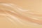Beige abstract background with flashes of light and soft waves