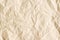 Beige aged paper sheet background.