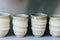 Beige and blue pottery cups