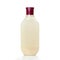 Beige bottle with shampoo. Close up. Isolated on white background