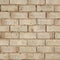 Beige brick wall background, texture