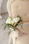 Beige bridal bouquet on a sofa