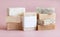 Beige and brown handmade soap bars on light pink close up, soap packaging mockup