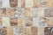 Beige and brown porcelain tiles with imitation of natural stone