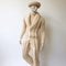 Beige Cable Knit Jumpsuit Mannequin In Mannerist Style