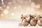 Beige christmas balls with brown ornaments and bows on glitter bokeh backdrop. Christmas holiday and festive decoration