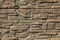 Beige-colored decorative stone wall, texture, background