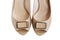 Beige feminine shoes with open toe and bow, isolated