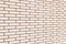Beige fine brick wall background perspective
