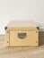 Beige folding storage box made of durable cardboard for storing papers, documents