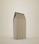 Beige lunch paper bag standing on beige background