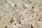 Beige mosaic granite wall background texture