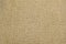 Beige natural linen fabric with brilliance golden lurex close-up