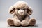 A beige plush toy bear isolated on a white background. Can be used for eco friendly kids toys.