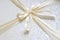 beige ribbon with bow