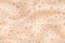 Beige seamless pattern with milkshake texture top view