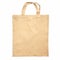 Beige shopping bag made of cotton fabric with handles isolated on white background