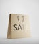 Beige shopping bag with sale text on it