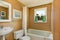 Beige simple bathroom with window