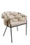 Beige soft armchair on black legs isolated on a white