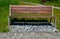 Beige threshing path gravel with delimited edges granite cubes in a row and dividing channels from the cube trough channel due to