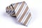 Beige tie rolled on white background