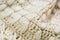 Beige waved knitwear texture background macro