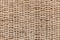 Beige wicker basket texture background, abstract symmetric seamless brown pattern, handmade
