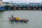 Beihai, China - July 20, 2019: A Fisherman on a Small Boat in Guangxi Province