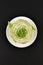 Beijing cabbage on a black background. Permanent manager of fresh, dietary green and white Peking cabbage. In the shape of a