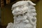 Beijing / China - 05.11.2019 :  White stone statue of the celestial lion at the entrance to the administrative building
