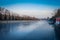 BEIJING, CHINA - 29 JANUARY, 2017: Frozen water channel inside forbidden city, trees alongside river bank, beautiful