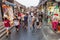 BEIJING, CHINA - AUGUST 26, 2018: Crowded hutong street in Beijing, Chi