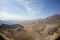 Beijing, China - CIRCA 2020: Great Wall of China in a green forest landscape at Mutianyu in Huairou District near Beijing, China.