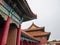 Beijing - A close up on the rooftop of a pavilion in Forbidden City in Beijing, China. The building is very colorful